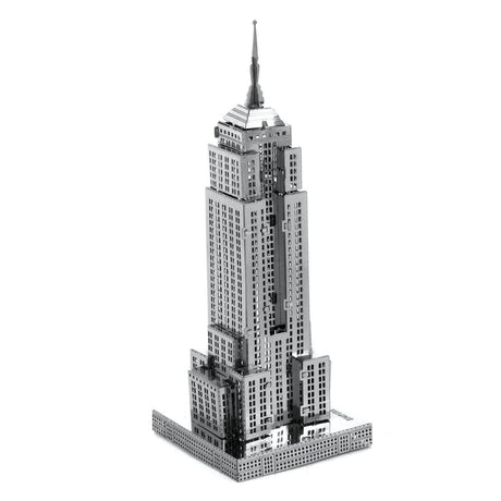 Metal model of the Empire State Building skyscraper on a white background