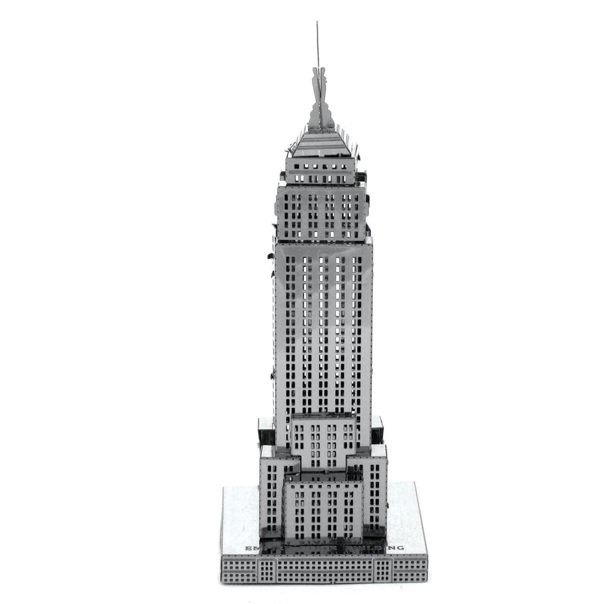Metal model of the Empire State Building skyscraper on a white background