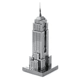 Metal model of the Empire State Building skyscraper on a white background
