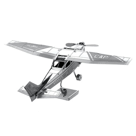 Metal model of a Cessna 172 airplane on a white background