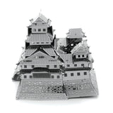Metal model  of Himeji Castle on a white background