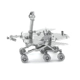Metal model of the Mars Rover on a white background