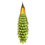 Metal Peacock feather decoration on a white background