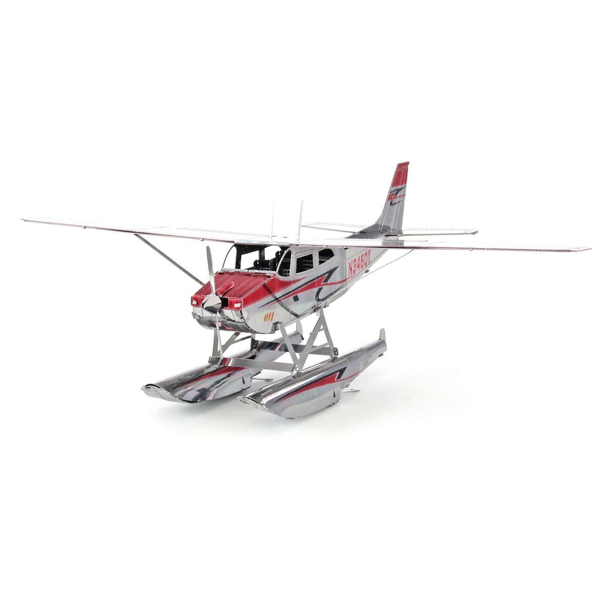 Metal model of a Cessna 182 Floatplane  with floats on a white background