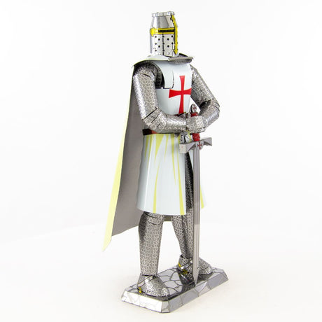 Model of a metal Templar Knight in full armor with a white tunic and red cross, standing on a white background.
