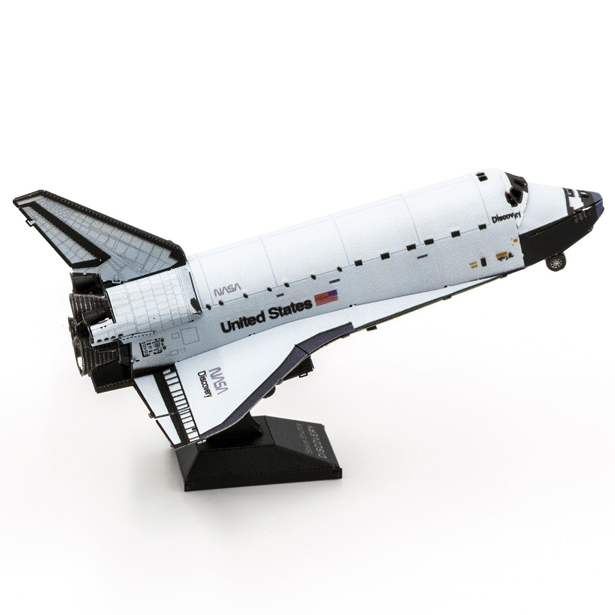 Metal model of Space Shuttle Discovery on a white background