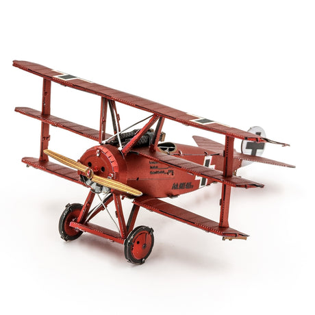 Metal model of a red Fokker Dr.I Triplane  on a white background