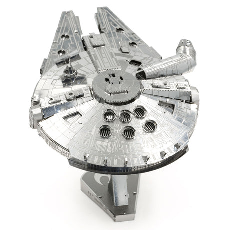 Metal model of the Millennium Falcon spaceship on a white background