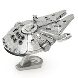 Metal model of the Millennium Falcon spaceship on a white background