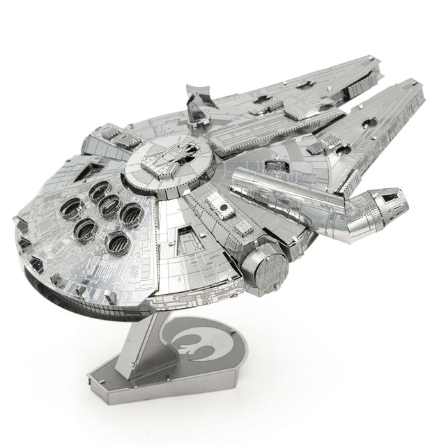 Metal model of the Millennium Falcon spaceship on a white background