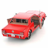 Red metal model of a 1965 Ford Mustang car with open doors on a white background
