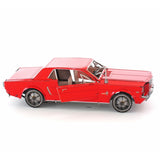 Red metal model of a 1965 Ford Mustang car on a white background