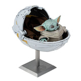 Metal Star Wars The Child model  in a pod on a white background
