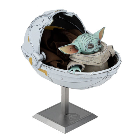 Metal Star Wars The Child model  in a pod on a white background