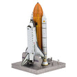 Metal model of Space Shuttle Launch Kit with orange rocket on a white background