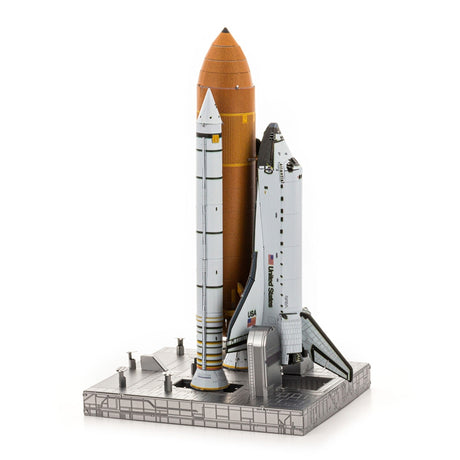 Metal model of Space Shuttle Launch Kit and rocket on a white background