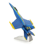 Metal model of a Blue Angels F/A-18 Super Hornet of a blue and yellow fighter jet on a white background