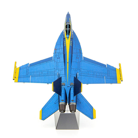 Metal model of a Blue Angels F/A-18 Super Hornet blue and yellow jet  on a white background