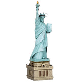 Metal model of the Statue of Liberty on a white background