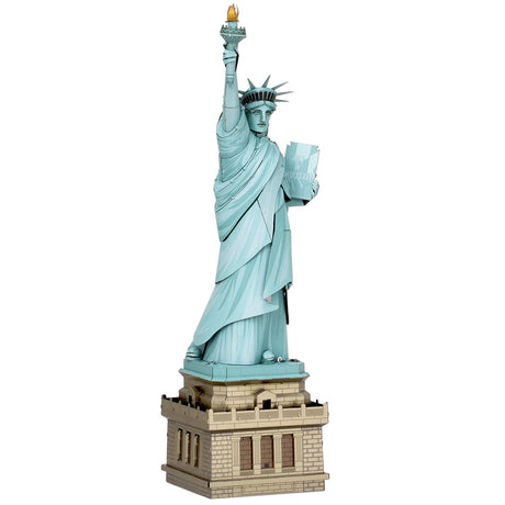Metal model of the Statue of Liberty on a white background