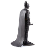 Metal modal of Batman The Dark Knight on a white background with cape on a white background