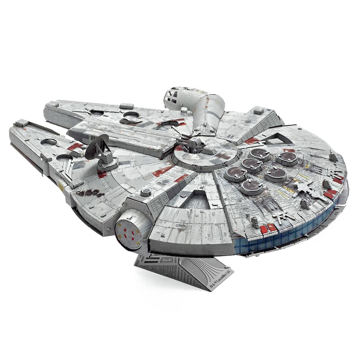 Metal model of the Millennium Falcon from Star Wars on a white background