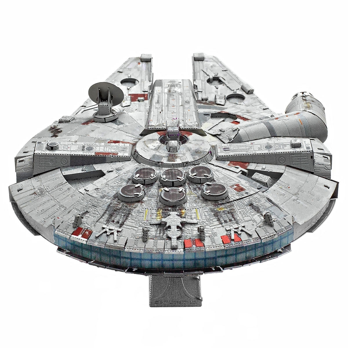 Metal model of the Millennium Falcon spaceship on a white background