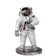 Metal models of a Apollo 11 Astronaut in a white space suit with a helmet on a white background