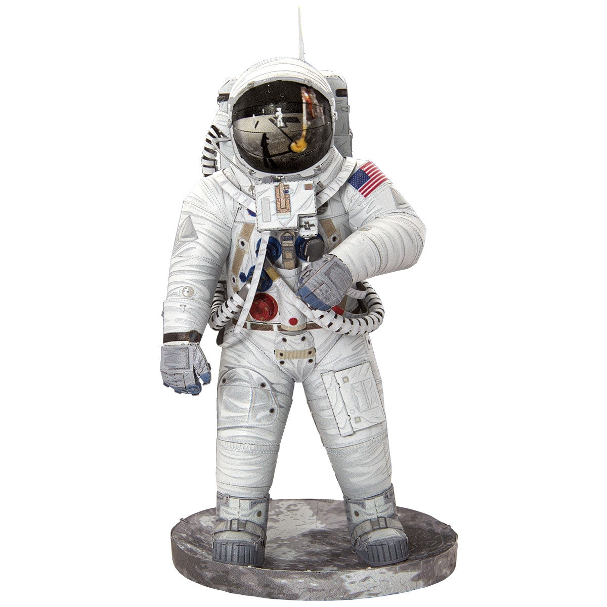 Metal models of a Apollo 11 Astronaut in a white space suit with a helmet on a white background
