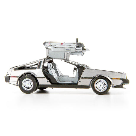 Metal model of a DeLorean car with a white background