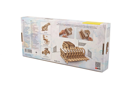 Box packaging of a mechanical model kit with step-by-step assembly instructions on a white background