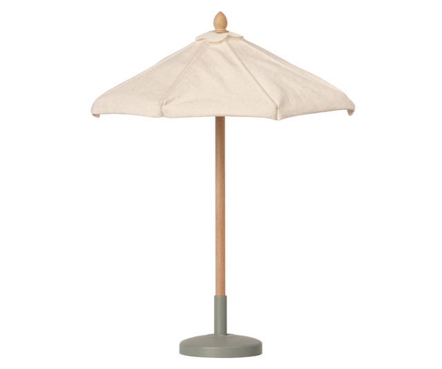 A small Maileg Sunshade, Miniature with a cream fabric canopy, a natural wood pole, and a muted sage green base, shown against a plain white background.