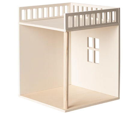 A minimalist wooden Maileg House of miniature - Bonus room with an open floor, a small window cutout on the side, and a slatted top platform, shown against a plain white background.