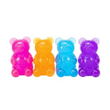 Four colorful Nee Doh Gummy Bears on a white background