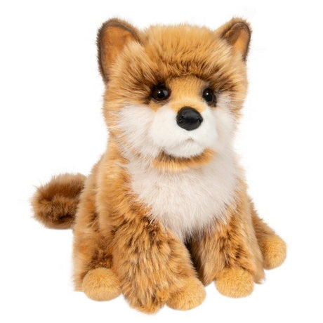 Plush toy Dove Pomsky sitting on a white background