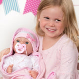 Child holding a Adora Adoption Babies - Hope 