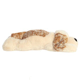 Plush toy resembling a dog on a white background