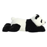Plush panda toy lying down on a white background