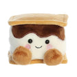 Plush toy resembling a s'more with a smiling face on a white background