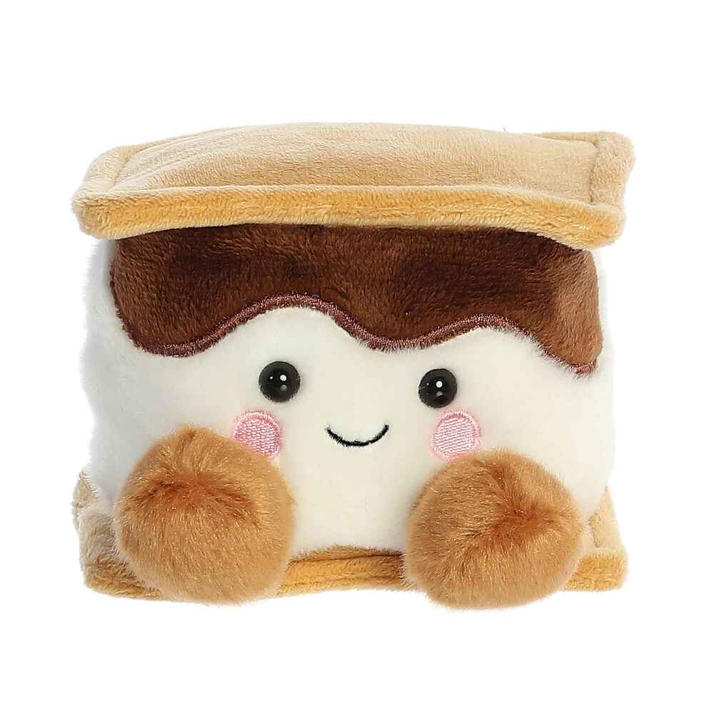 Plush toy resembling a s'more with a smiling face on a white background