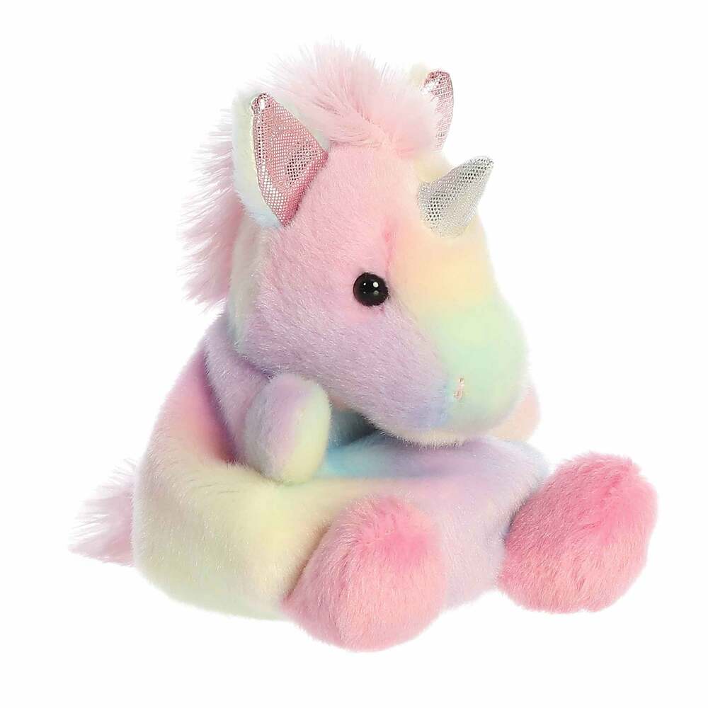 Pastel-colored unicorn plush toy on a white background