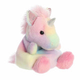 Pastel-colored unicorn plush toy on a white background