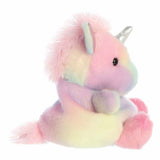 Pastel-colored unicorn plush toy on a white background