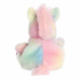 Pastel-colored plush unicorn on a white background