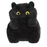 Black plush toy cat with yellow eyes on a white background