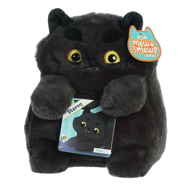Black plush cat toy with a tag on a white background