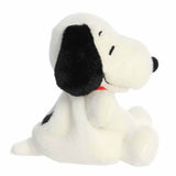 Plush toy of a dog with a black nose on a white background