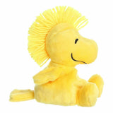 Yellow plush bird toy on a white background