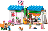 LEGO Friends: Dog Treats Bakery  set with characters and accessories on a green background
