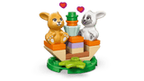 LEGO Friends: Heartlake City Bunny Hotel building block set with animal figures on a green background